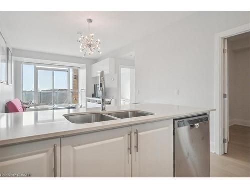 407-2480 Prince Michael Drive, Oakville, ON - Indoor Photo Showing Kitchen With Double Sink