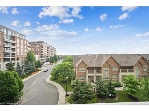 407-2480 Prince Michael Drive, Oakville, ON - Outdoor With Balcony With Facade