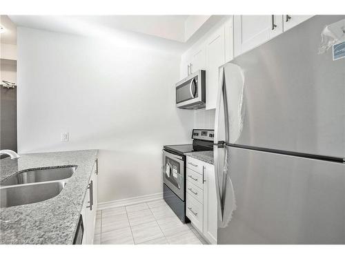 103-2393 Bronte Road Road, Oakville, ON - Indoor Photo Showing Kitchen With Stainless Steel Kitchen With Double Sink