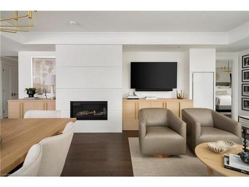 804-2060 Lakeshore Road, Burlington, ON - Indoor Photo Showing Living Room With Fireplace