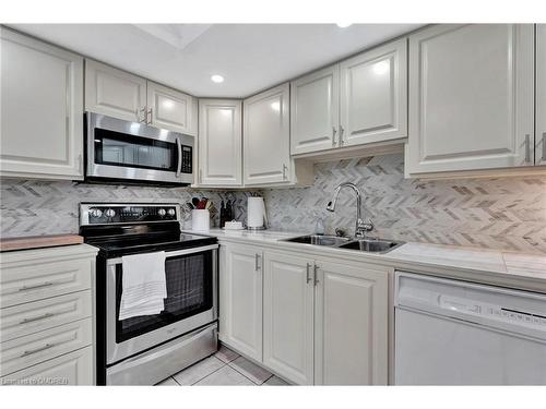 503-1201 North Shore Boulevard, Burlington, ON - Indoor Photo Showing Kitchen With Double Sink