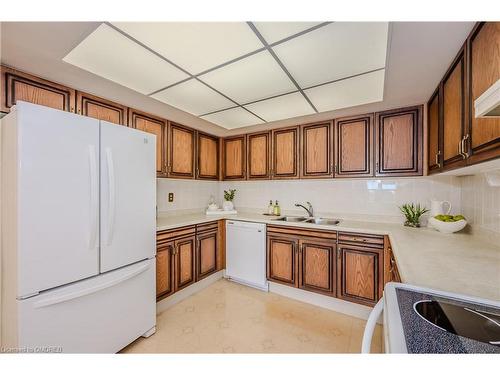 1705-2180 Marine Drive, Oakville, ON - Indoor Photo Showing Kitchen With Double Sink