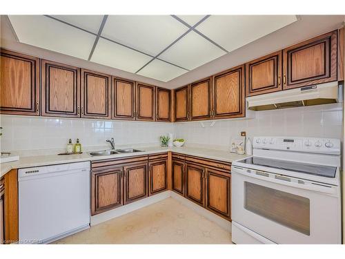 1705-2180 Marine Drive, Oakville, ON - Indoor Photo Showing Kitchen With Double Sink