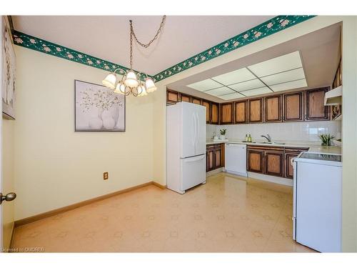 1705-2180 Marine Drive, Oakville, ON - Indoor Photo Showing Kitchen With Double Sink