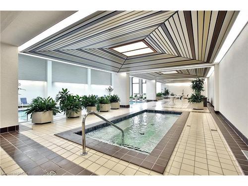 1705-2180 Marine Drive, Oakville, ON - Indoor Photo Showing Other Room With In Ground Pool