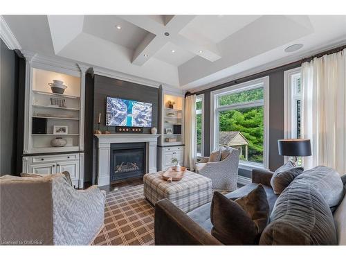 3064 St Clair Avenue, Burlington, ON - Indoor Photo Showing Living Room With Fireplace