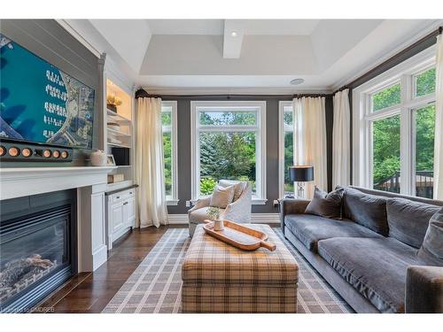 3064 St Clair Avenue, Burlington, ON - Indoor Photo Showing Living Room With Fireplace