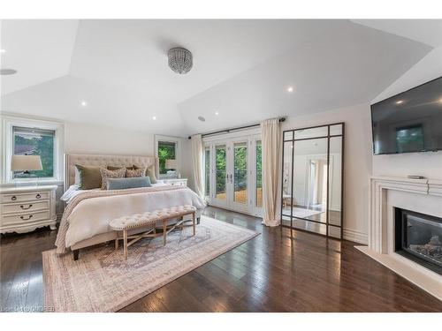 3064 St Clair Avenue, Burlington, ON - Indoor Photo Showing Bedroom With Fireplace