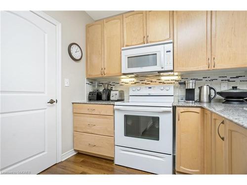 212-383 Main Street E, Milton, ON - Indoor Photo Showing Kitchen