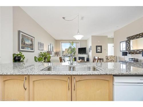 212-383 Main Street E, Milton, ON - Indoor Photo Showing Kitchen With Double Sink With Upgraded Kitchen