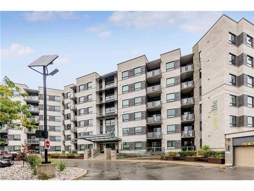 212-383 Main Street E, Milton, ON - Outdoor With Facade