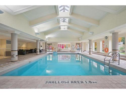 Ph1-1900 The Collegeway, Mississauga, ON - Indoor Photo Showing Other Room With In Ground Pool