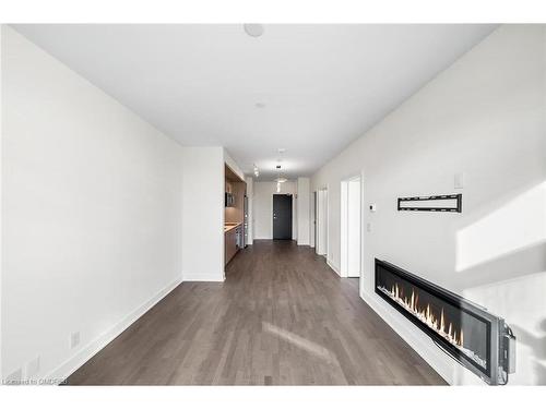 404-1575 Lakeshore Road W, Mississauga, ON - Indoor With Fireplace