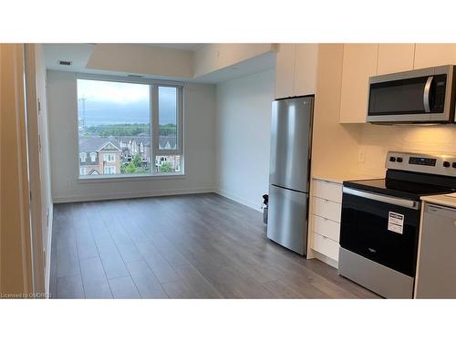 513-1440 Clarriage Court, Milton, ON - Indoor Photo Showing Kitchen With Stainless Steel Kitchen