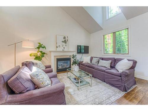 14-2141 Caroline Street, Burlington, ON - Indoor Photo Showing Living Room With Fireplace