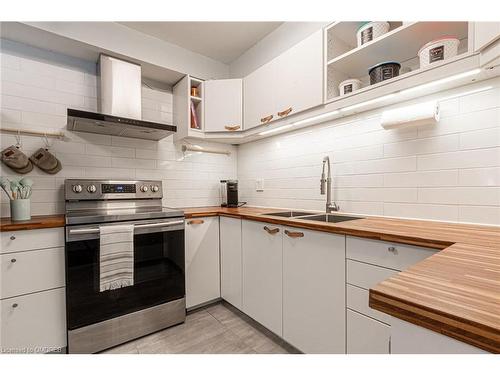 3-4199 Longmoor Drive, Burlington, ON - Indoor Photo Showing Kitchen With Double Sink