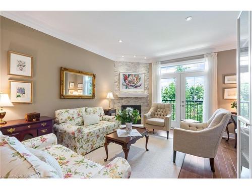 8-117 Nelson Street, Oakville, ON - Indoor Photo Showing Living Room With Fireplace