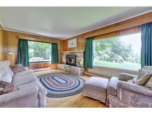 2022 Valens Road N, Hamilton, ON - Indoor Photo Showing Living Room With Fireplace