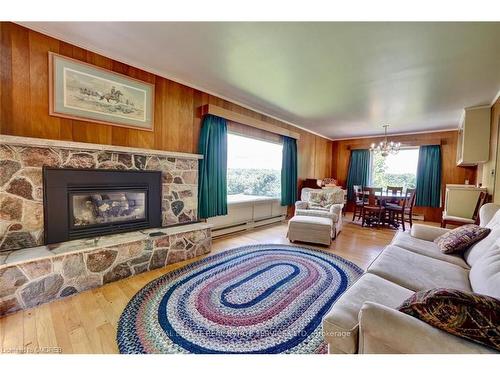 2022 Valens Road N, Hamilton, ON - Indoor Photo Showing Living Room With Fireplace