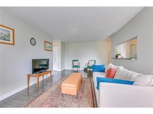 204-1950 Main Street W, Hamilton, ON - Indoor Photo Showing Living Room