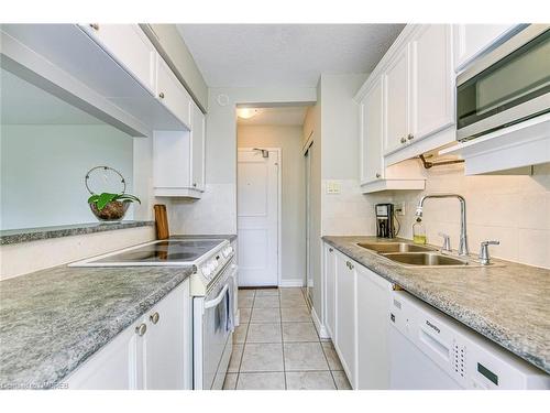 204-1950 Main Street W, Hamilton, ON - Indoor Photo Showing Kitchen With Double Sink