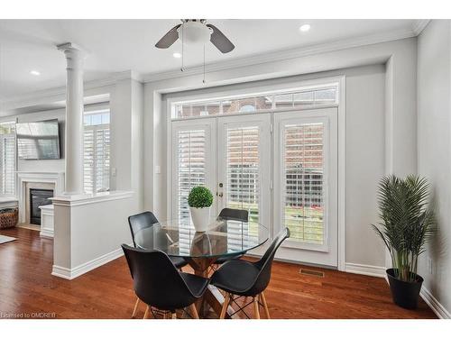 3105 Jenn Avenue, Burlington, ON - Indoor Photo Showing Dining Room With Fireplace