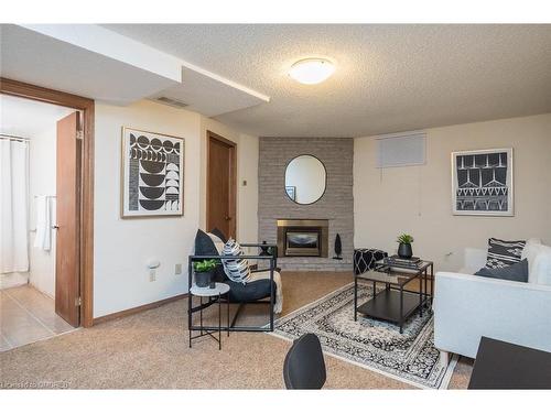 79 Ironstone Drive, Cambridge, ON - Indoor Photo Showing Living Room With Fireplace