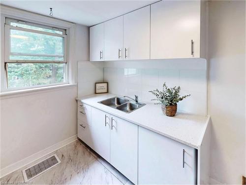 109 East 11Th Street, Hamilton, ON - Indoor Photo Showing Kitchen With Double Sink