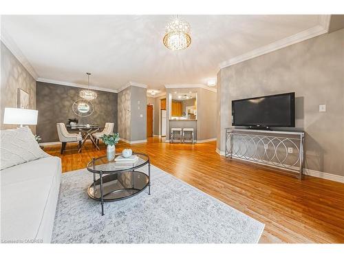 302-443 Centennial Forest Drive, Milton, ON - Indoor Photo Showing Living Room