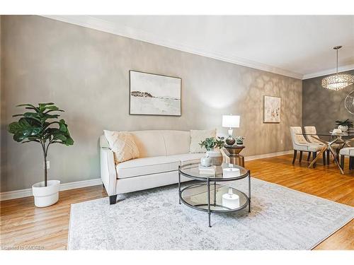 302-443 Centennial Forest Drive, Milton, ON - Indoor Photo Showing Living Room