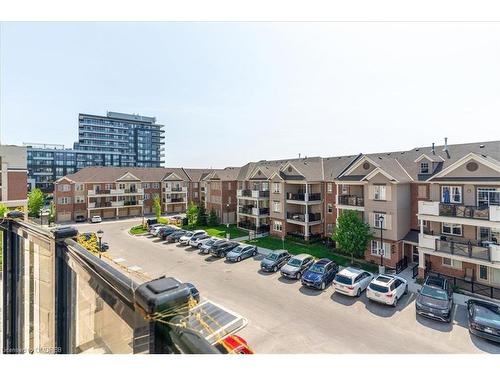 302-216 Oak Park Blvd Boulevard, Oakville, ON - Outdoor With Balcony With Facade