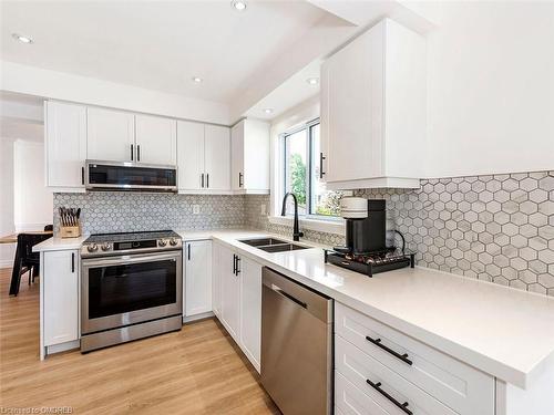 14 Pompano Court, Hamilton, ON - Indoor Photo Showing Kitchen With Stainless Steel Kitchen With Double Sink With Upgraded Kitchen