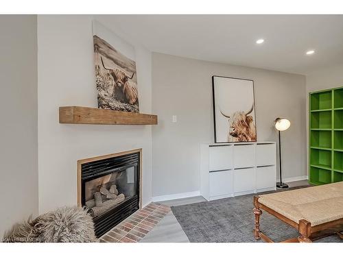 2320 Strawfield Court, Oakville, ON - Indoor Photo Showing Living Room With Fireplace