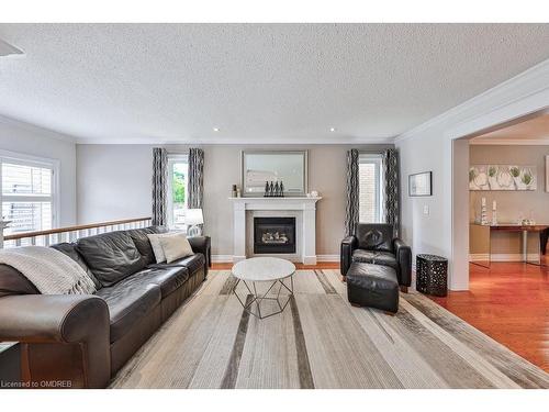 8 Inverhuron Trail, Oakville, ON - Indoor Photo Showing Living Room With Fireplace