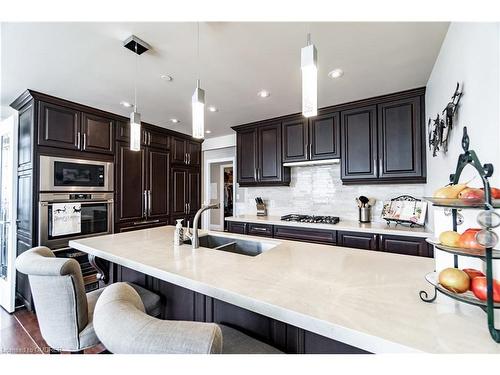 327-3500 Lakeshore Rd W, Oakville, ON - Indoor Photo Showing Kitchen With Double Sink With Upgraded Kitchen