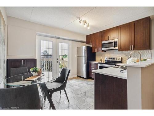 305-4005 Kilmer Drive, Burlington, ON - Indoor Photo Showing Kitchen