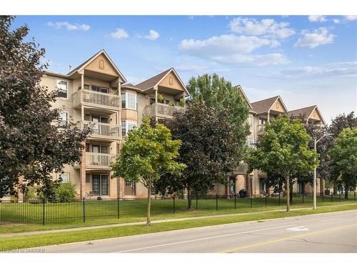 305-4005 Kilmer Drive, Burlington, ON - Outdoor With Balcony With Facade