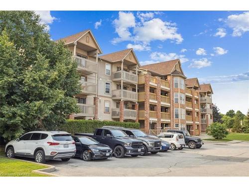 305-4005 Kilmer Drive, Burlington, ON - Outdoor With Balcony With Facade