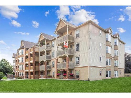 305-4005 Kilmer Drive, Burlington, ON - Outdoor With Balcony With Facade