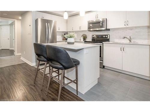 4-01-2420 Baronwood Drive, Oakville, ON - Indoor Photo Showing Kitchen With Stainless Steel Kitchen With Upgraded Kitchen