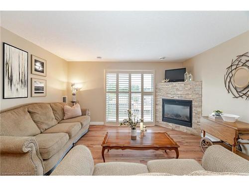 406-12 St Andrews Street, Port Dover, ON - Indoor Photo Showing Living Room With Fireplace