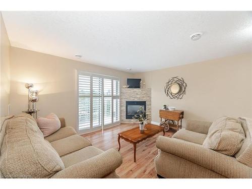 406-12 St Andrews Street, Port Dover, ON - Indoor Photo Showing Living Room With Fireplace