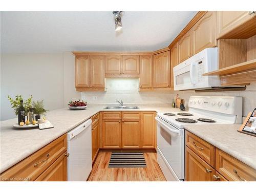 406-12 St Andrews Street, Port Dover, ON - Indoor Photo Showing Kitchen With Double Sink