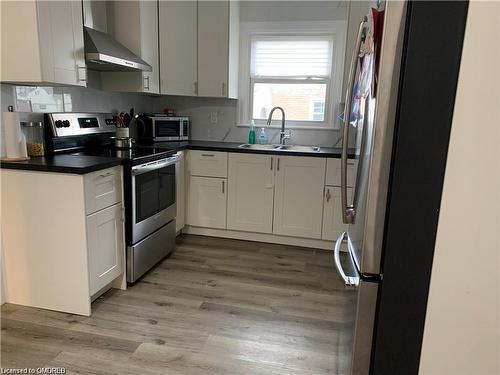 Upper-482 East 37Th Street, Hamilton, ON - Indoor Photo Showing Kitchen With Double Sink