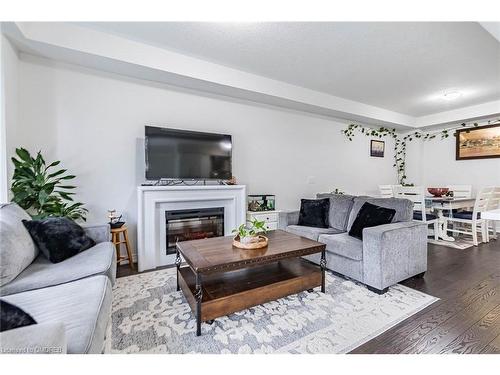 89 Gloria Street E, Kitchener, ON - Indoor Photo Showing Living Room With Fireplace