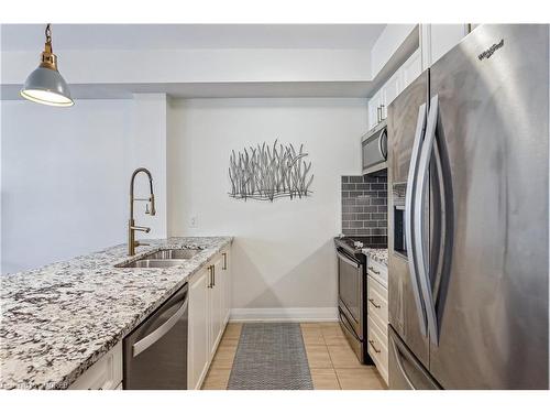 212-2375 Bronte Road, Oakville, ON - Indoor Photo Showing Kitchen With Stainless Steel Kitchen With Double Sink With Upgraded Kitchen