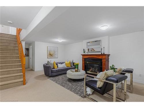 21 Logan Court, Barrie, ON - Indoor Photo Showing Living Room With Fireplace