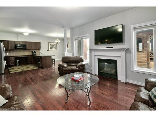 38 Maple Drive, Wasaga Beach, ON - Indoor Photo Showing Living Room With Fireplace