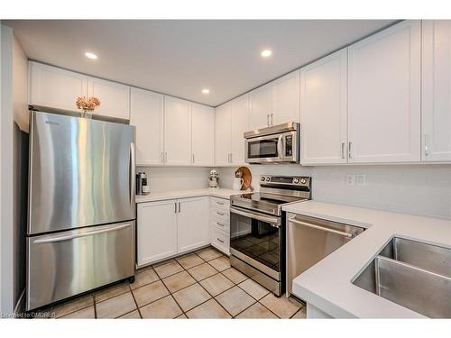 2059 White Dove Circle, Oakville, ON - Indoor Photo Showing Kitchen With Double Sink