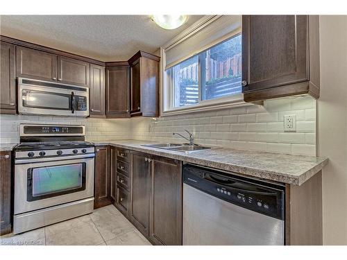 123 Coulas Crescent, Waterford, ON - Indoor Photo Showing Kitchen With Double Sink